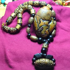 Gold aluminum and black plastic beads... original design.